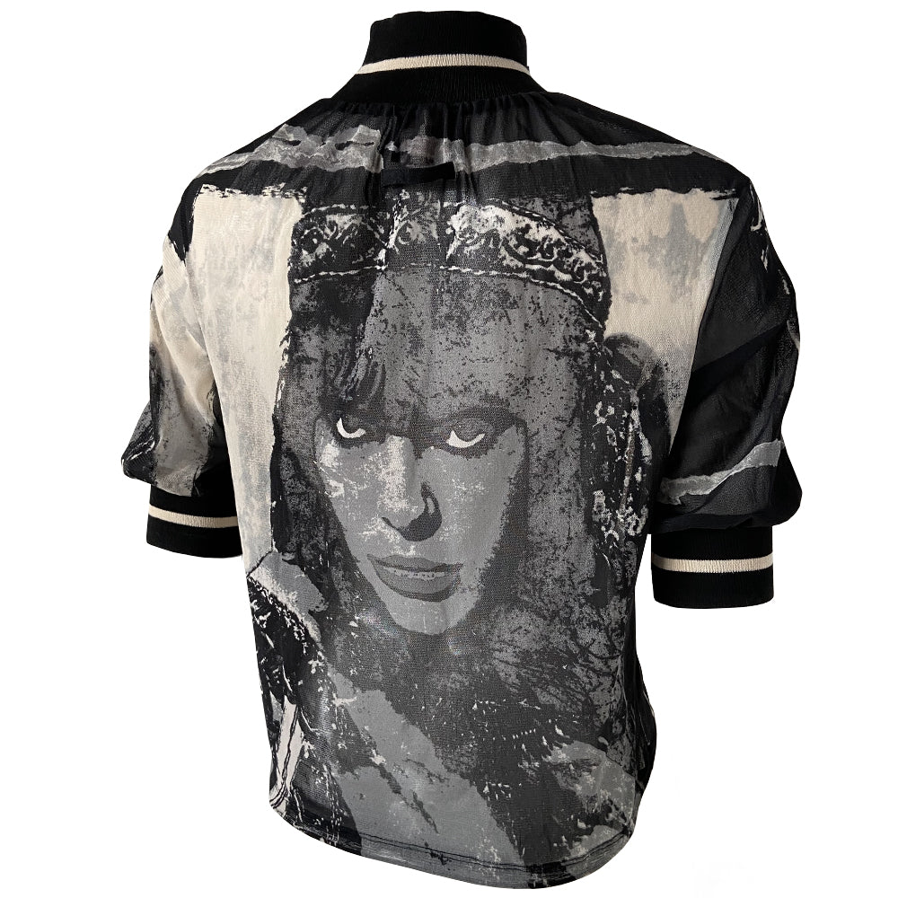 Jean Paul Gaultier 5th Element black and white mesh 3/4 sleeve top by Jean Paul Gaultier JPG 1997 with front and back portrait of Leeloo, knit mock collar and sleeve hems with white accent stripe. Elastic drawstring ties at bottom hemline. Made in Japan