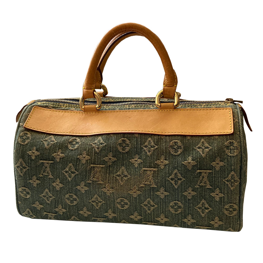 Louis Vuitton blue stonewashed monogram denim Neo Speedy Bag by Marc Jacobs for Louis Vuitton, 2005. 2 outer front pockets with gold-tone push lock closures and outer zip pocket. Vachetta leather trimmed with 2 rolled leather handles. Top zipper closure opens to gold/tan alcantara lining, one interior slip pocket. Made in France
