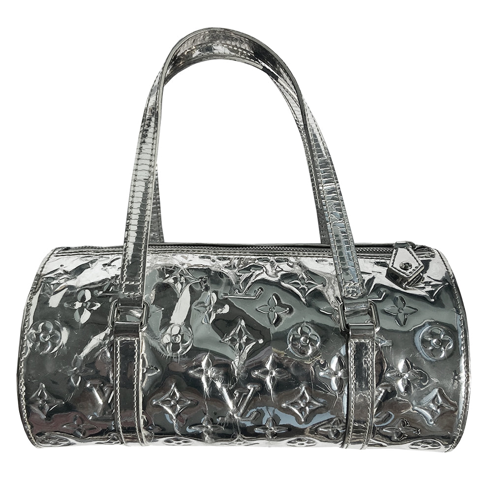 Louis Vuitton Miroir Papillon limited Marc Jacobs for Louis Vuitton, FW runway 2006. Brilliant silver-tone monogram mirrored vinyl body, 2 mirrored flat leather top handles & trim, exterior slip pocket at one end, top zipper closure, mirrored leather zipper pull, grey canvas interior. Date code: MB1016. Made in France