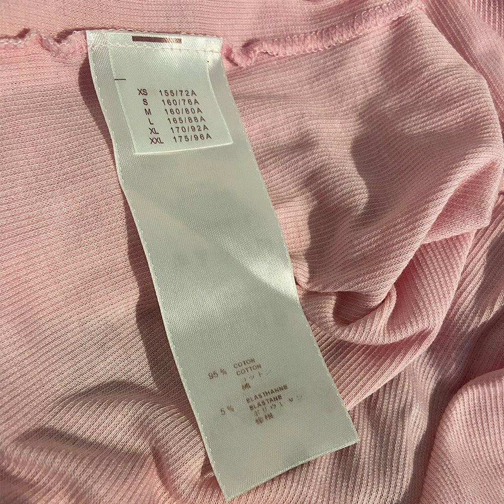 Louis Vuitton pink rib knit tank top with white beaded LV logo at center chest and accent at neckline and around arm holes by Marc Jacobs for Louis Vuitton. Made in Italy