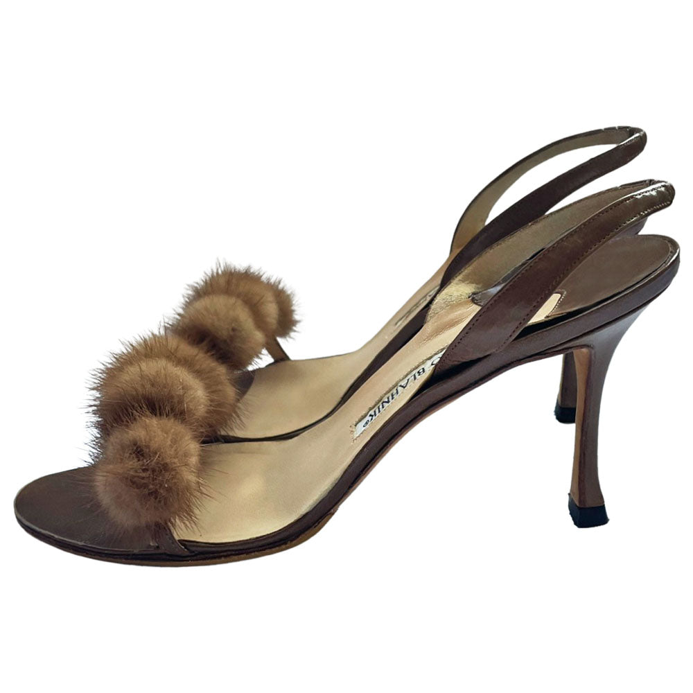 Manolo Blahnik bronze leather strappy heels with 4 mink pom-pom embellishments across the toe strap, slip-on elastic heel strap, open toe. Made in Italy
