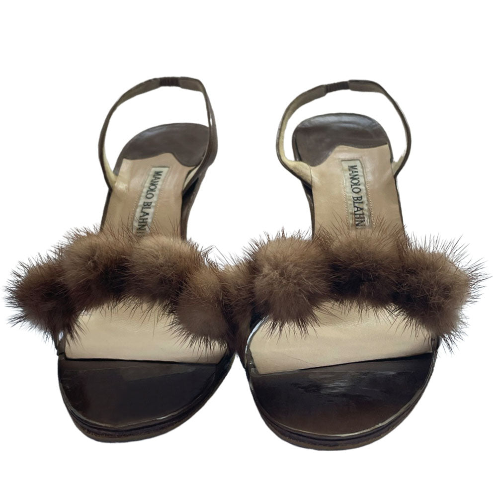 Manolo Blahnik bronze leather strappy heels with 4 mink pom-pom embellishments across the toe strap, slip-on elastic heel strap, open toe. Made in Italy