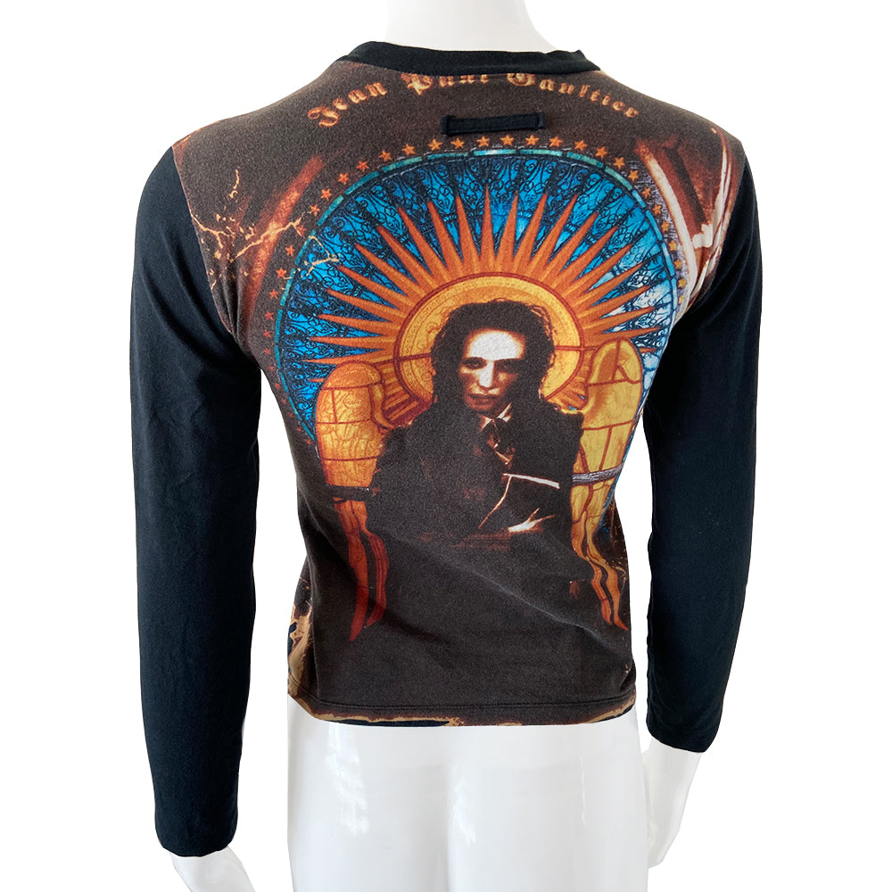 Jean Paul Gaultier long sleeved tee from Spring 1998 featuring Marilyn Manson against stained glass church window background on front and back. Tag size: 40 Main Color: Black. Made in Japan