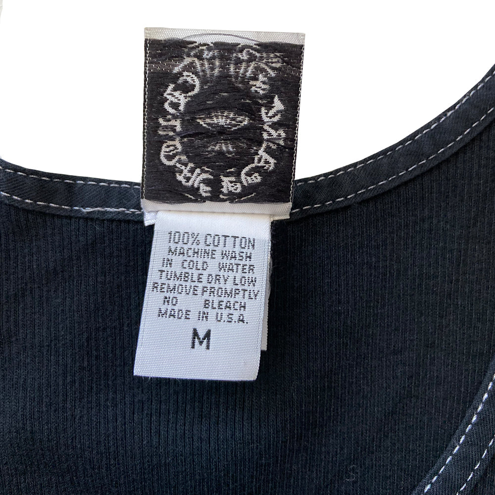 Chrome Hearts black Mapplethorpe tank, limited and rare from 2007 Mapplethorpe collaboration. Single front M with cross and heart design surrounded by tiny crosses, Chrome Hearts Mapplethorpe on back with Chrome Hearts scroll at bottom back hemline. Made in USA