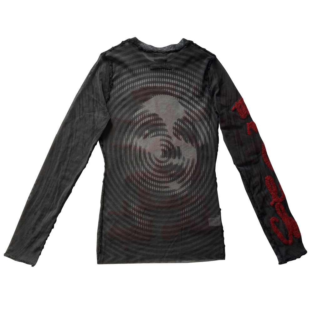 Jean Paul Gaultier Femme rare optical illusion long sleeve mesh top, AW 2001 featuring classic film icon Marlene Dietrich on front and back with red mohair front embroidered script writing and along one sleeve, black boucle accent trim on seams and neckline. Tag size: 40. Made in Japan