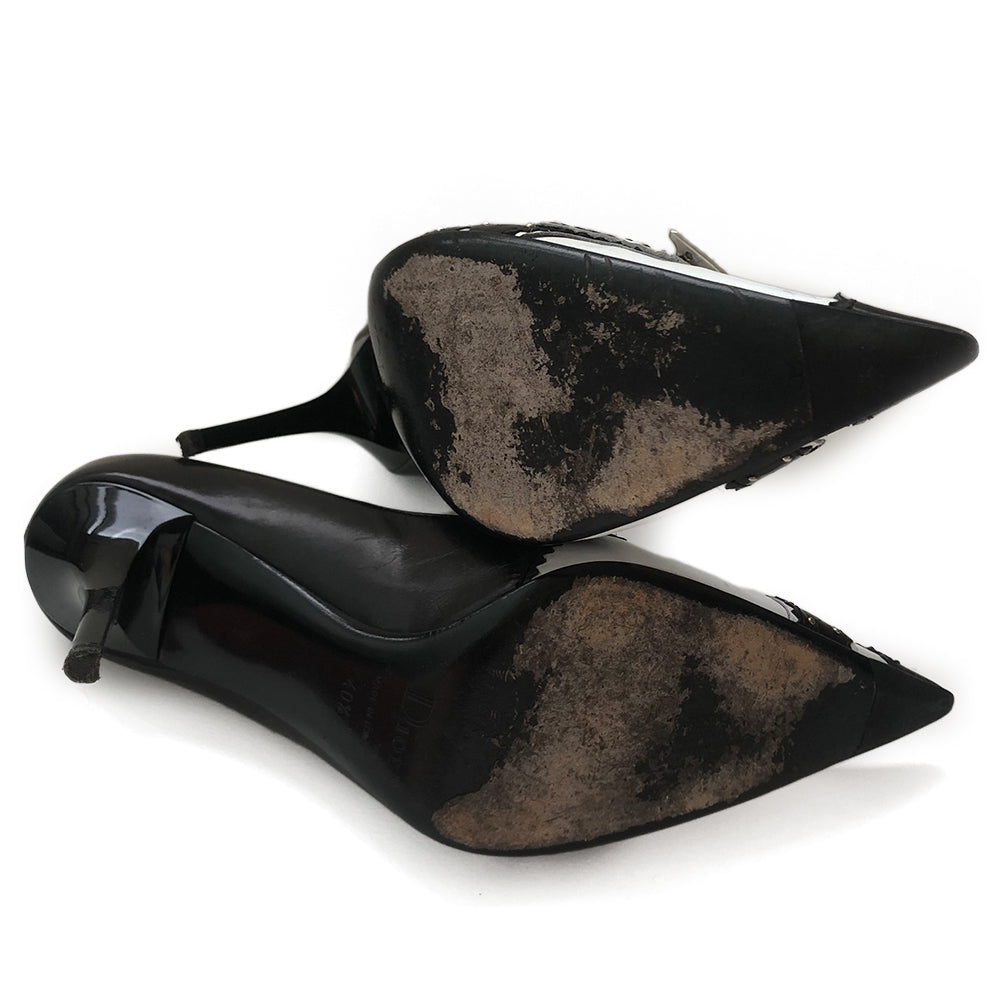 Dior D'Trick Black & White Leather D Pumps From the Spring 2004 RTW Collection By John Galliano. Perforated, scalloped leather silver D logo buckle, pointed toe. Box, dust bag and extra heel taps included. Made in Italy