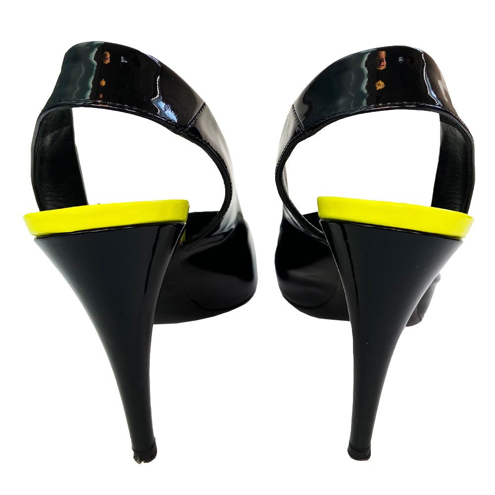 Louis Vuitton Monogram Graffiti Stephen Sprouse collection slingback heels from 2008 in patent calf leather upper and 3" patent heels, leather sole. Black with neon green Louis Vuitton graffiti Size: IT 39. Made in Italy.