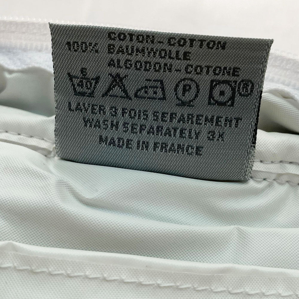 Christian Dior navy monogram terry towel mini boston bag circa 2005 with No. 2 white appliqué in front, white piping on handles and zipper. Waterproof vinyl interior with 2 slip pockets Zipper closure with white textile ribbon zipper pull.