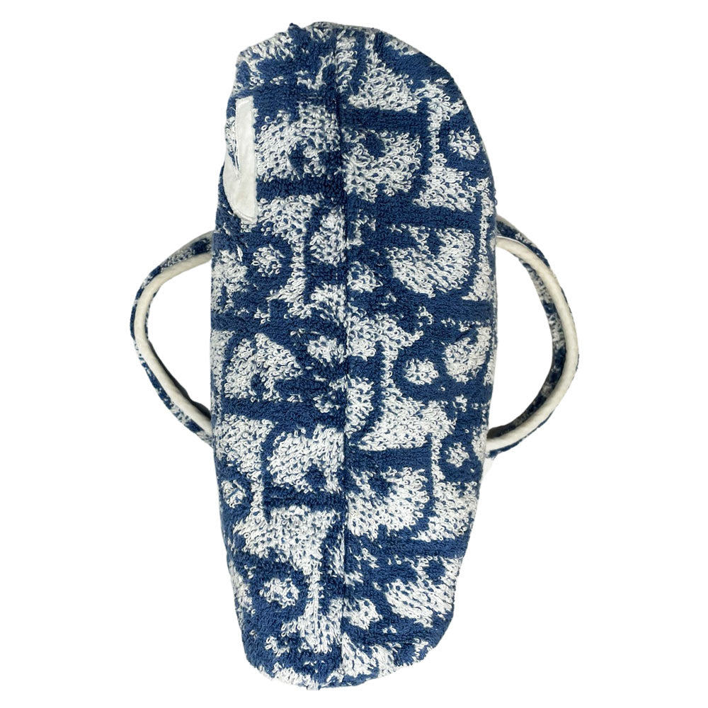 Christian Dior navy monogram terry towel mini boston bag circa 2005 with No. 2 white appliqué in front, white piping on handles and zipper. Waterproof vinyl interior with 2 slip pockets Zipper closure with white textile ribbon zipper pull.