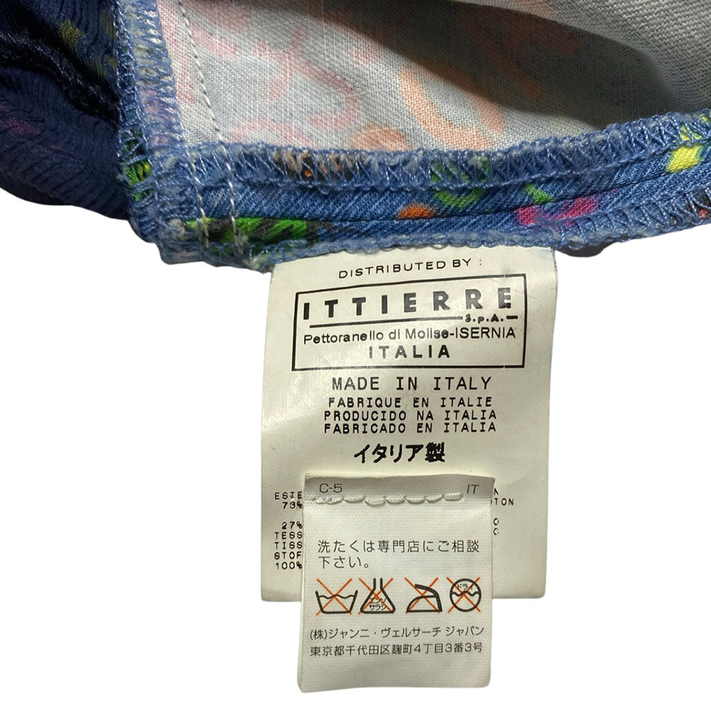 Versace Jeans Couture 1990's blue, pink, orange, yellow printed dress featuring butterflies & graffiti with a light weight denim bodice, adjustable straps, silver tone front zip, invisible side zip for fit, boning in cups. Angled printed chiffon skirt with solid navy chiffon lining. Butterfly patch in back, silver-tone studs. Made in Italy