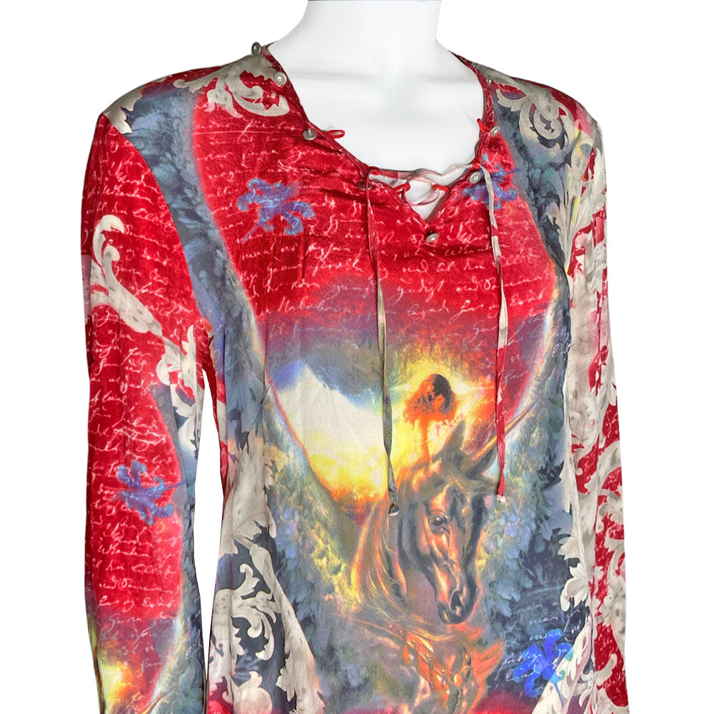 90's cult London label, Voyage long sleeve 100% silk unicorn print shirt featuring all over script print on arms and bell sleeves. Crossed lacing at front neckline, decorated with Swarovski embellished buttons around the collar.