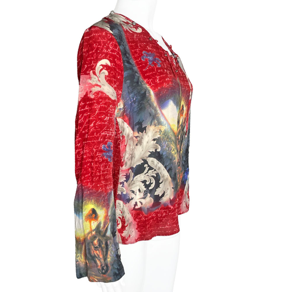 90's cult London label, Voyage long sleeve 100% silk unicorn print shirt featuring all over script print on arms and bell sleeves. Crossed lacing at front neckline, decorated with Swarovski embellished buttons around the collar.