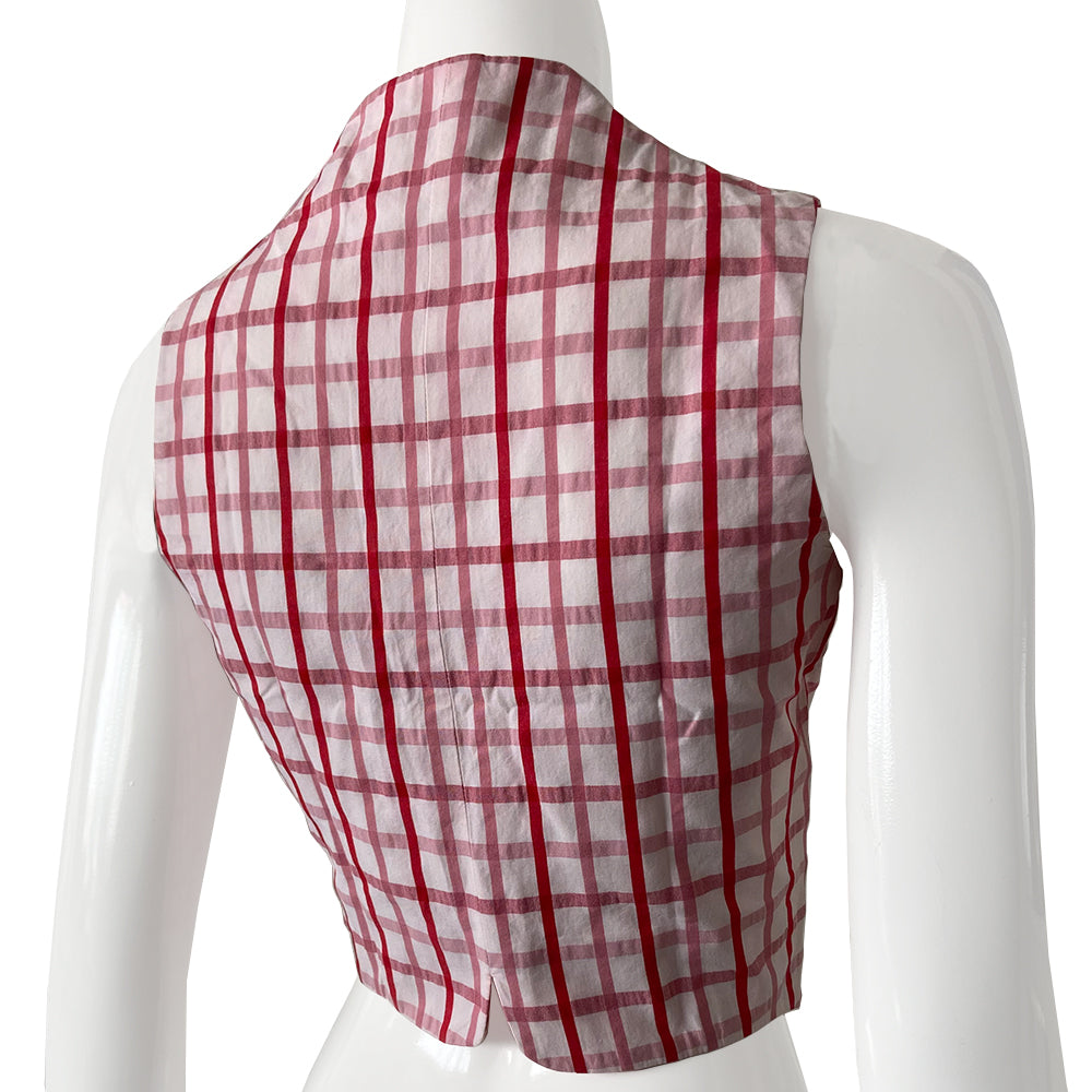 Vivienne Westwood 100% cotton sleeveless corset style check button up vest by Vivienne Westwood Red Label from 1991. Pink and white check scooped neck sleeveless short waisted top or vest with scalloped style hemline, angled front seams and pin tucking that accentuates bust line. Orb logo buttons front closure.