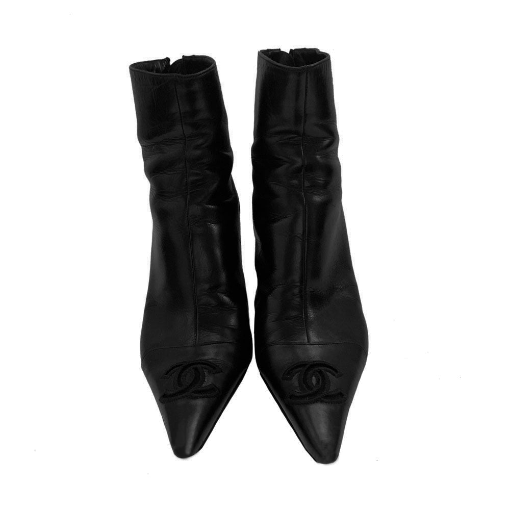 Chanel black leather CC logo short boots, Karl Lagerfeld for Chanel with pointed toe, high heels and embroidered edge mesh interlocking CC logo. Rear zipper closure with gold-tone interlocking CC logo zipper pull. Leather interior and soles Size: 36.5.  Made in Italy 