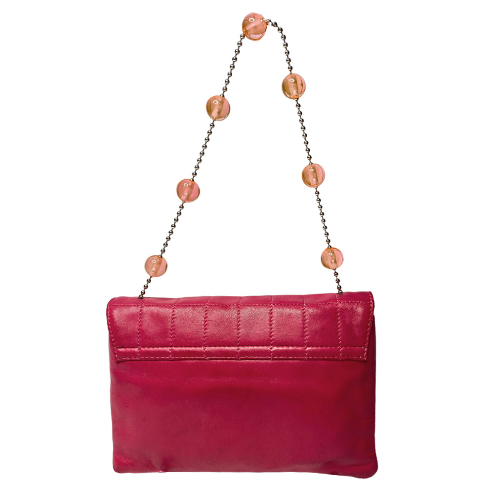 Chanel fuchsia choco quilt soft lamb double body flap bag with silver-tone metal ball chain strap and pink transluscent lucite baubles by Karl Lagerfeld for Chanel, 2000. Front bauble clasp closure with embedded silver-tone CC logo opens to dual partitioned compartments lined in tonal grosgrain, one interior zip pocket. Made in Italy