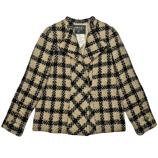 Chanel 1994 gold & black tweed jacket by Karl Lagerfeld for Chanel, autumn 1994 with wrist length sleeves, single snap button closure. Three Chanel CC gold & black buttons on each sleeve. Made in France 