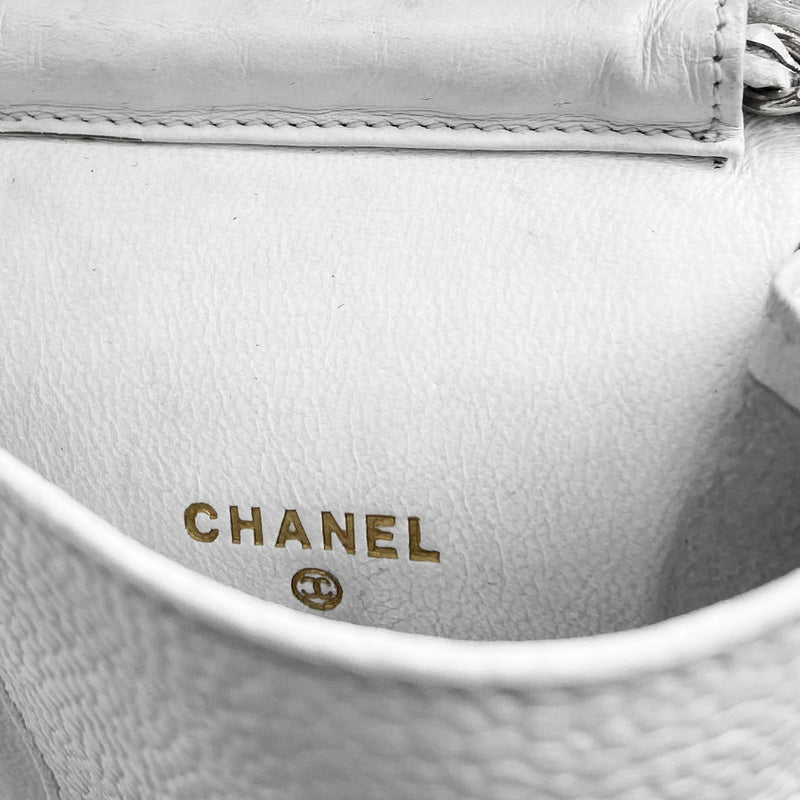 Chanel white caviar mini cross body cigarette/cellphone bag by Karl Lagerfeld for Chanel, circa 1994-1996 with stitched interlocking CC logo flap top with intertwined leather and gold-tone long chain strap. Chanel logo stamped inside leather interior Date code sticker intact. Made in Italy 