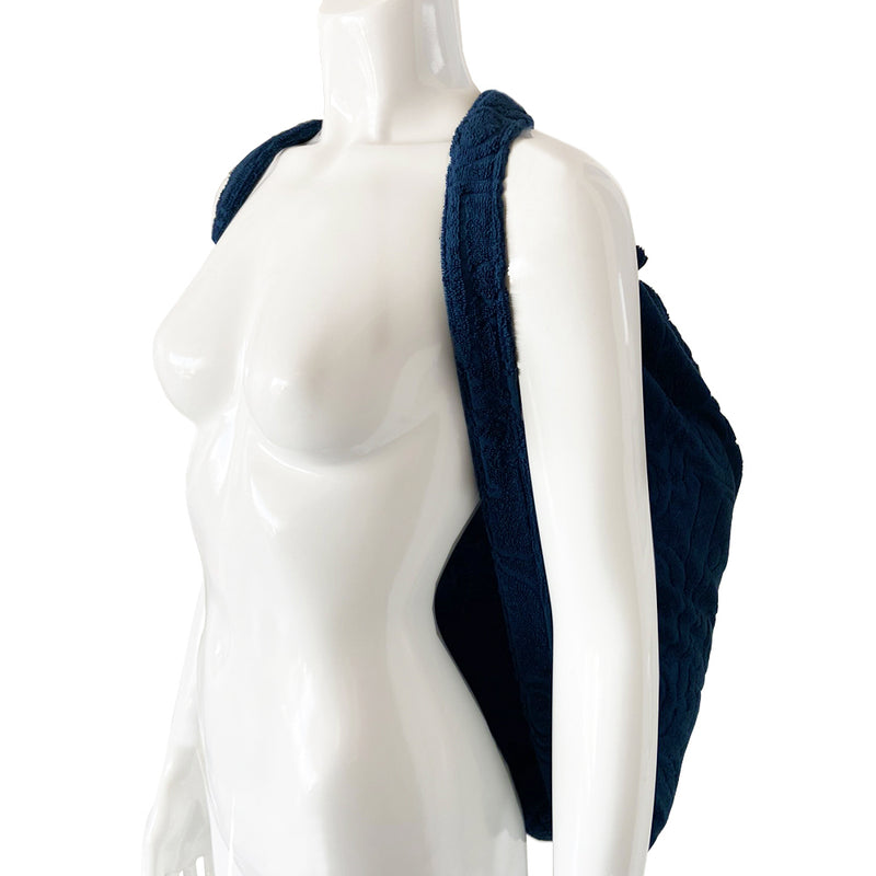 Christian Dior marine blue towel and backpack set with all over Dior logo jacquard terry towelling fabric with drawstring closure backpack and matching logo jacquard towel Fabric: 100% Cotton. Made in France 