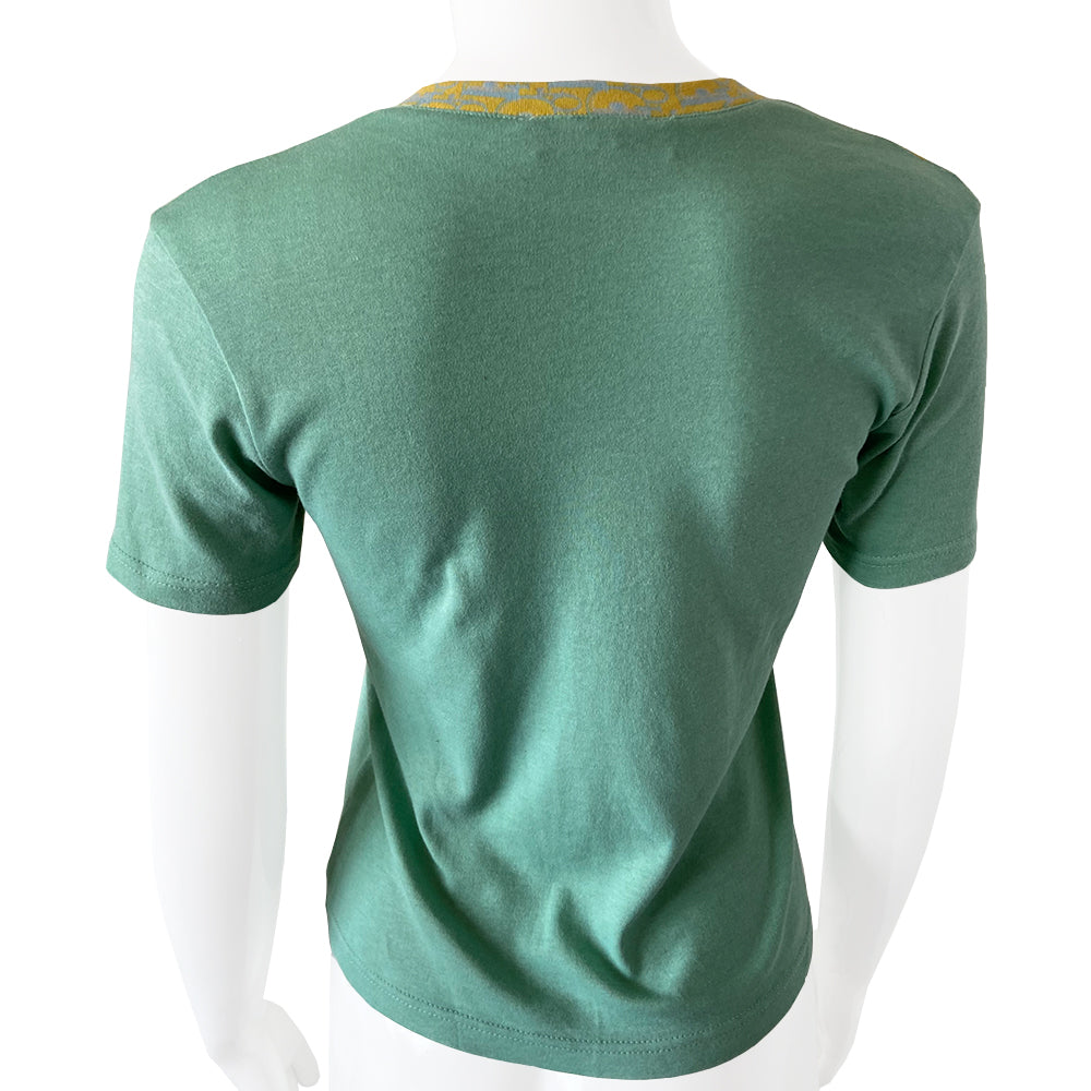 Christian Dior J’Adore Dior short sleeve V neck spring 2005 runway patchwork tee from Japan featuring a patchwork of iconic John Galliano for Dior logo designs through the years Fabric: 100% cotton.  Color: Main: Turquoise and blue Fabric: 100% cotton Size: FR 38 Made in Portugal 