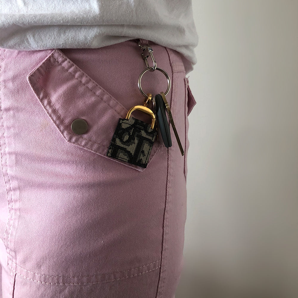 Christian Dior Pink Cargo Pants with hiigh waist flared leg and 4 pocket cargo style trousers with cargo pockets in front and back,  silver-tone metal engraved Christian Dior CD buttons, front zip closure. Silver-tone engraved metal clip for keys at front waistband
