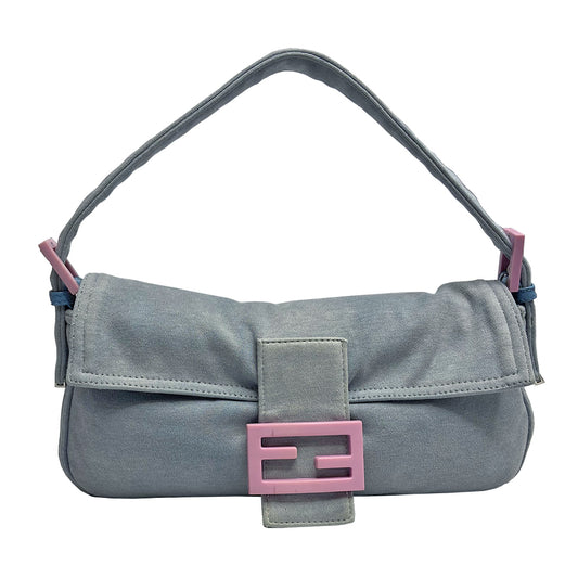 Fendi Jersey Fabric Baguette powder blue jersey fabric baguette with adjustable removal strap,  pink rubber buckles and front logo with silver-tone metal hardware. Front flap with magnetic closure, jersey lined with interior zippered pocket. Made in Italy 