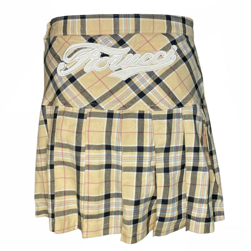 Fiorucci yellow, black, red high waisted plaid pleated flannel mini skirt, side zip with slash side pockets. White cotton appliqué 76 at hip and cursive Fiorucci logo at back waist 
