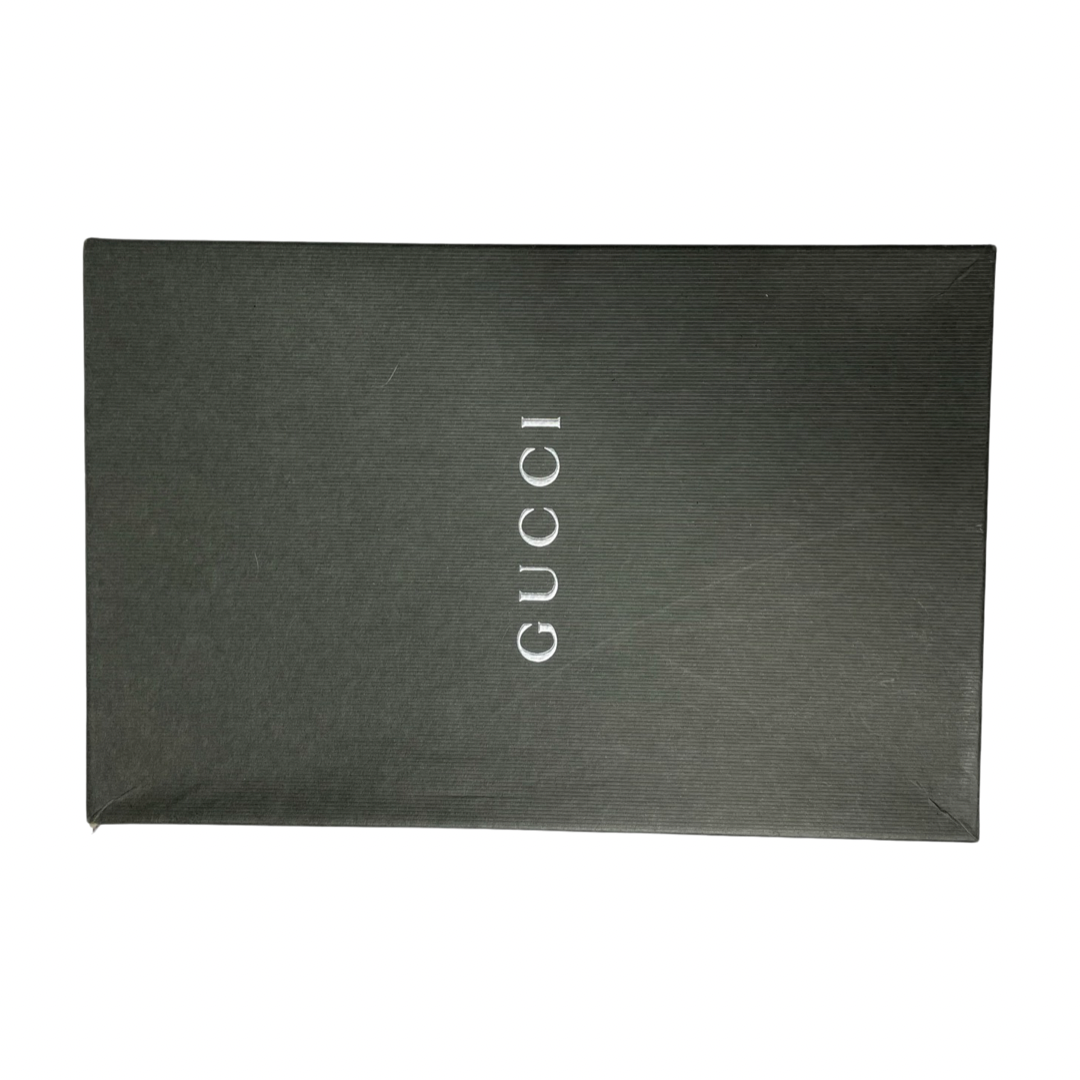 Gucci Mocassino Pelle Guarn Met black suede loafers with black wooden heel and silver-tone front Gucci embossed buckles. Leather soles with tan leather lining.  Made in Italy 