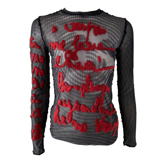 Jean Paul Gaultier Femme rare optical illusion long sleeve mesh top, AW 2001  featuring classic film icon Marlene Dietrich on front and back with red mohair front embroidered script writing and along one sleeve, black boucle accent trim on seams and neckline. Tag size: 40. Made in Japan 