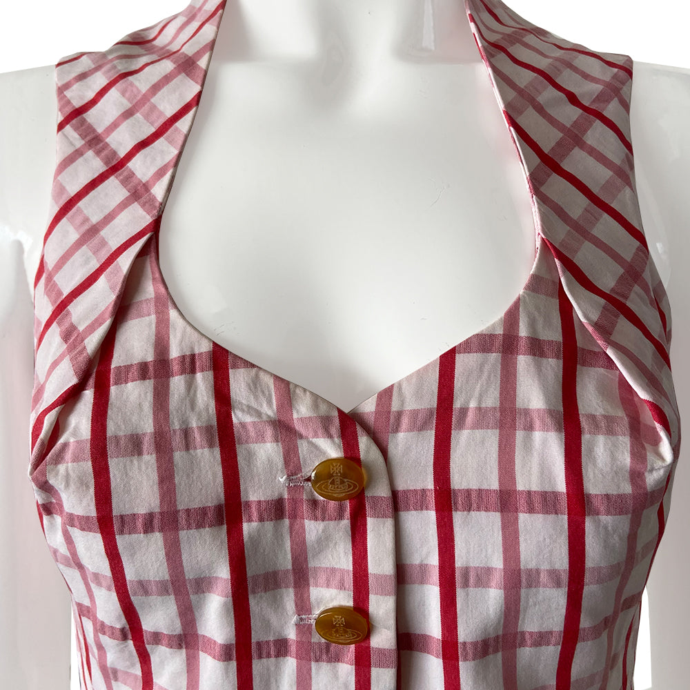 Vivienne Westwood 100% cotton sleeveless corset style check button up vest by Vivienne Westwood Red Label from 1991. Pink and white check scooped neck sleeveless short waisted top or vest with scalloped style hemline, angled front seams and pin tucking that accentuates bust line. Orb logo buttons front closure. 