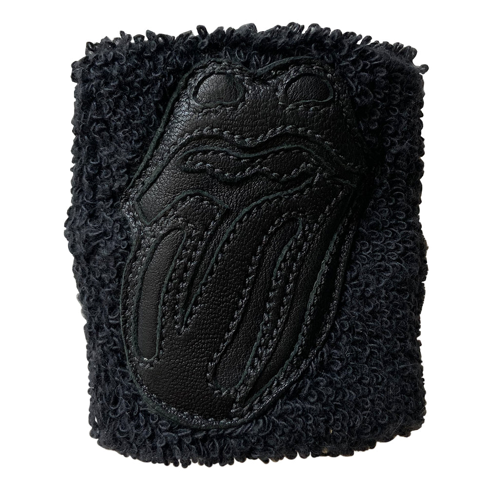 Chrome Hearts X Rolling Stones elasticized black terry wristband From 2012 with Rolling Stones black leather "Hot Lips” accent stitched appliqué on one side and Chrome Hearts sterling silver logo stud on the other.  Made in USA 