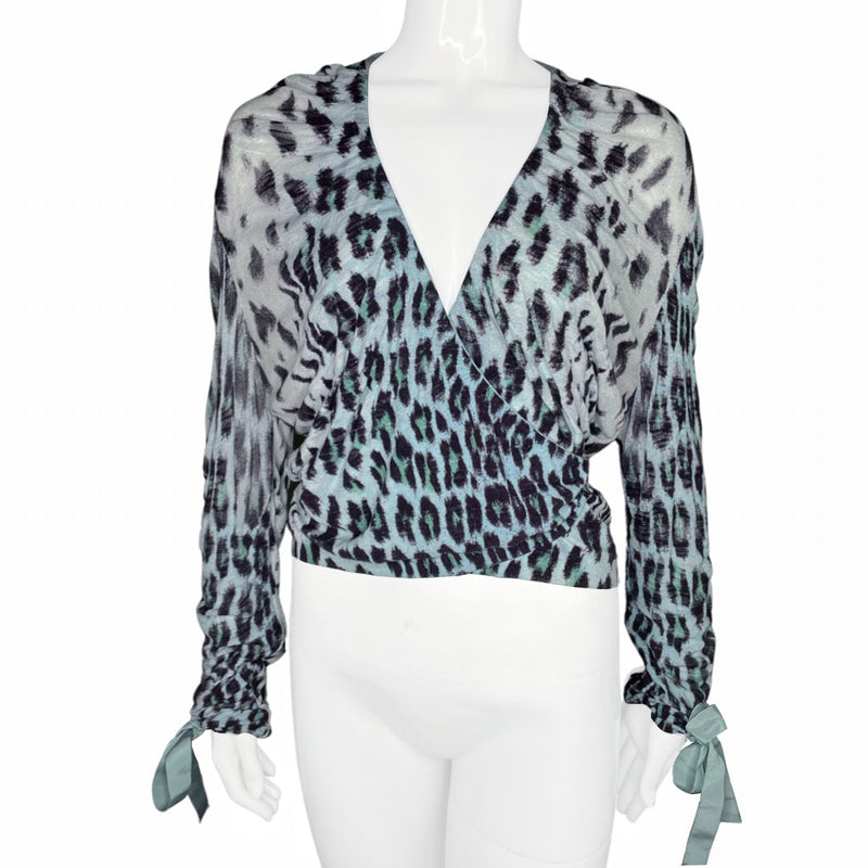 Blumarine black leopard print on pale blue background wrap knit sweater with pale blue accent edging, blue ribbon ties at waist and cuffs. Made in Italy 