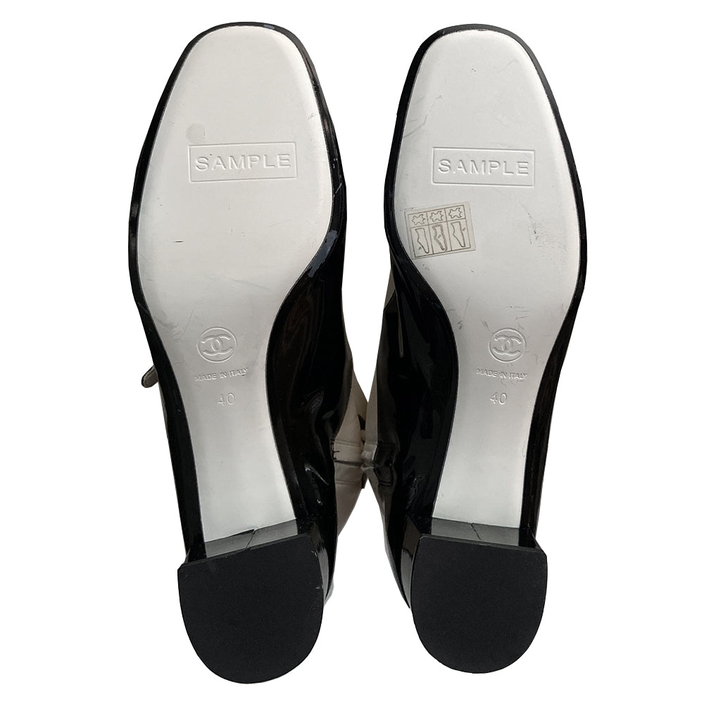 Chanel rare unused two-tone Mary Jane lamb leather sample boots from 2000 Cruise by Karl Lagerfeld for Chanel. Block heel black patent Mary Jane shoes attached to white lamb leather to the knee “sock” with black patent along the back boot shaft, gold-tone CC logo at outer heels. Original sticker on soles. Size: 40 Made in Italy 