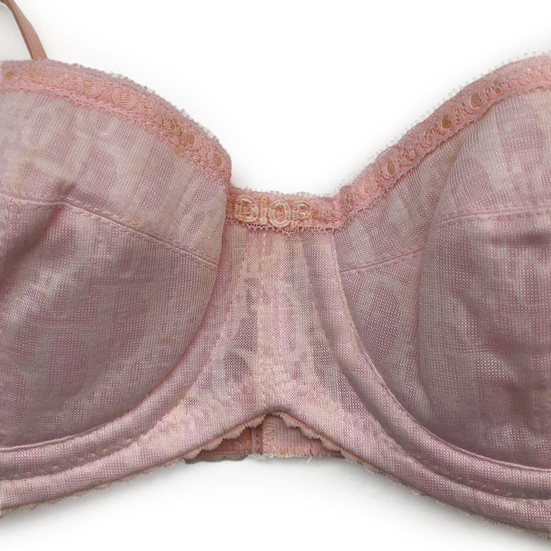 Christian Dior Monogram Trotter Pink Bra from Christian Dior Lingerie. Japanese Size: A70 All over monogram Trotter monogram pattern in pink on pink. Stretch satin adjustable straps with 3 hook closure Lace accent trim with delicate lace “Dior" in center.  