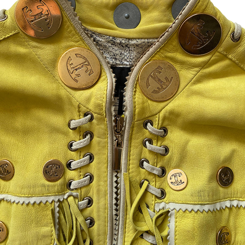 Just Cavalli Acid Yellow Fringe Leather Jacket Circa 2006 in excellent condition. Oversized and small gold-tone logo medallions decoration with whip stitching, fringe and grommets in soft sueded leather. A band of embroidery decorates the bottom hem. 