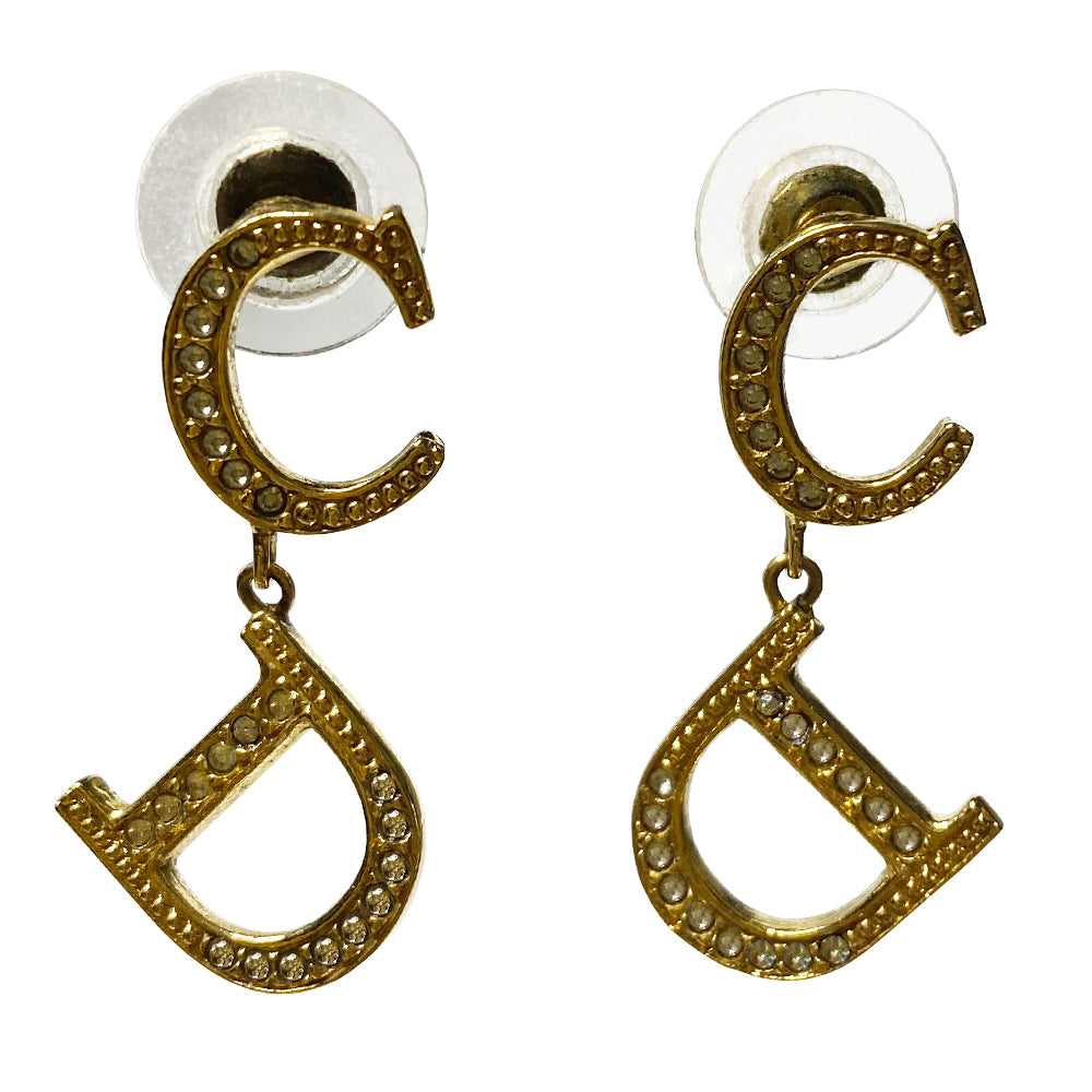 Christian Dior CD gold-tone metal ogo earrings embellished with white inset crystals and Dior logo stamp in back. Clutch back closure. 