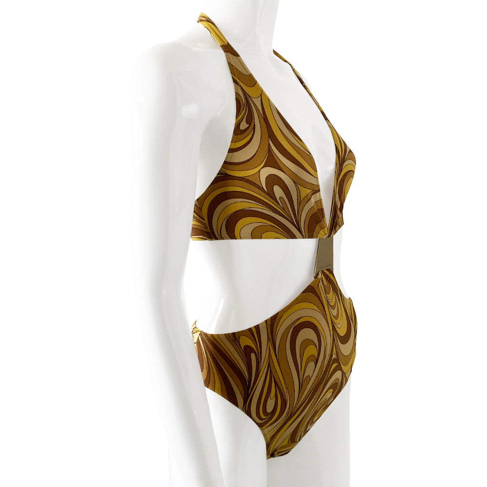 Celine psychedelic swimsuit with all over retro swirl design top and mid rise bottoms with a feature bronze-tone rectangular logo engraved plate that attaches the top to the bottom. Non adjustable halter style top with clip back logo closure, fully lined. Color: gold, brown, tan. Made in France 