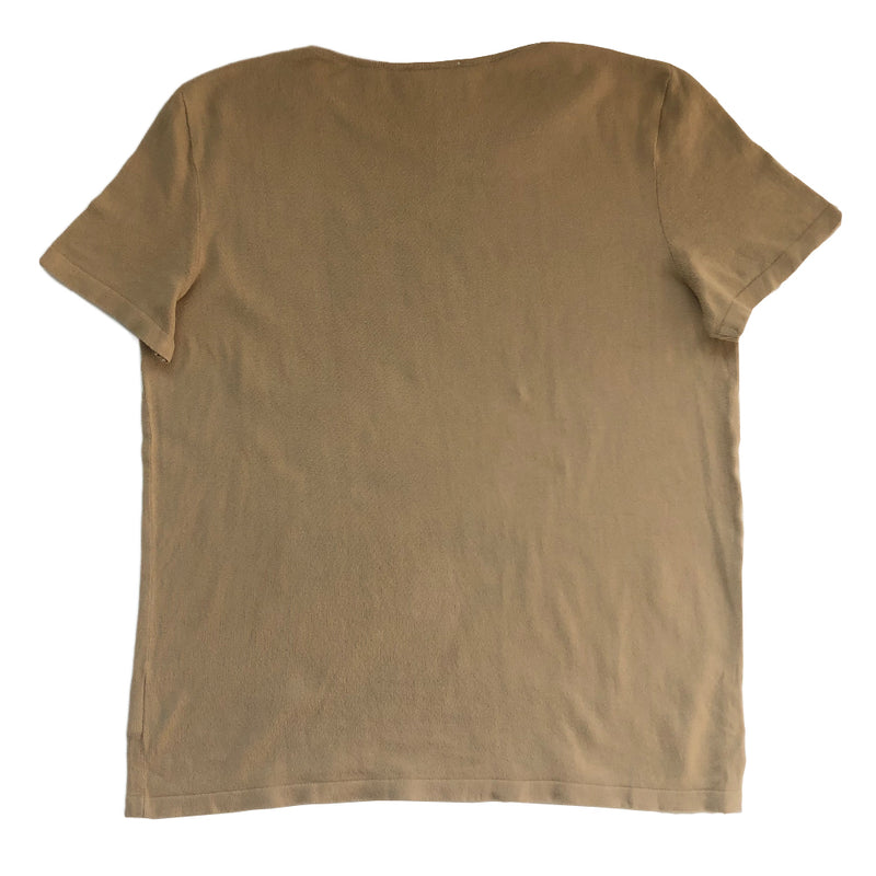 Chanel Tan color Short Sleeved Knit Top Interlocking with CC logo woven into fabric in front. Small repair to right shoulder, visually minimal while wearing. Short sleeves with round neck in fine rib knit of 100% cotton. Color: Tan Size: FR 44 Made in France 