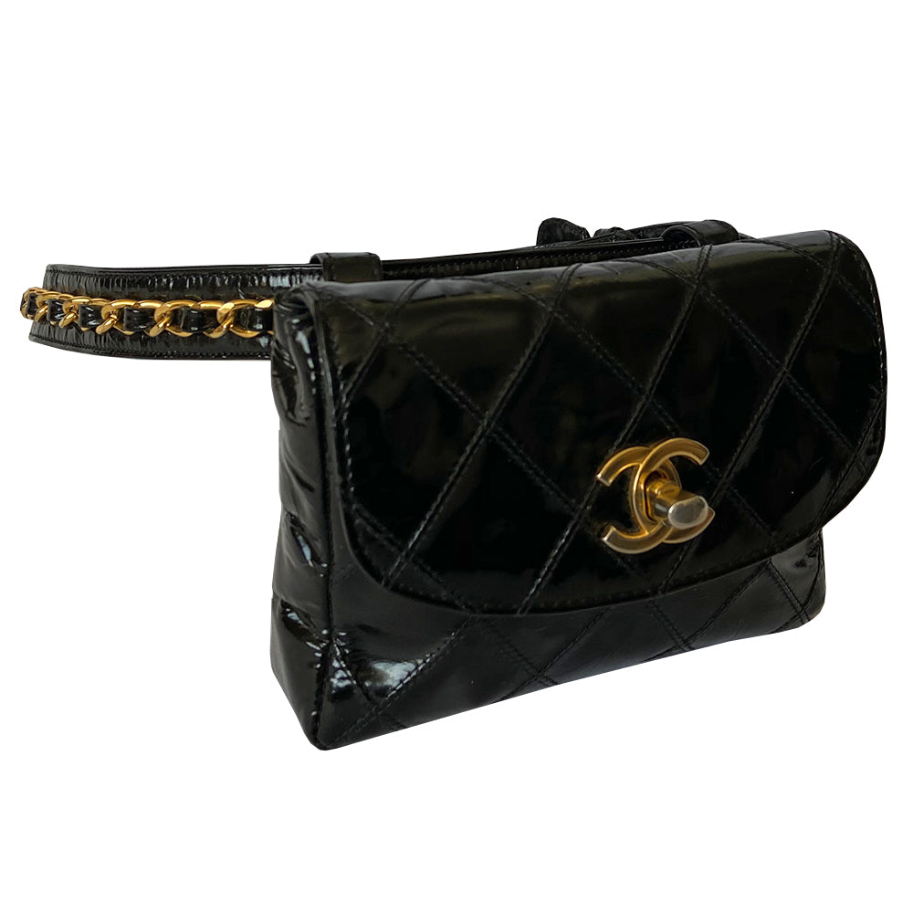 Chanel black quilted patent leather flap belt bag by Karl Lagerfeld for Chanel, with gold tone turnlock closure and woven gold chain attached to adjustable belt. Black leather interior with single zip pocket. Indicated belt size: 70cm / 28 Included: Original boutique sticker and guarantee cards. Made in Italy 