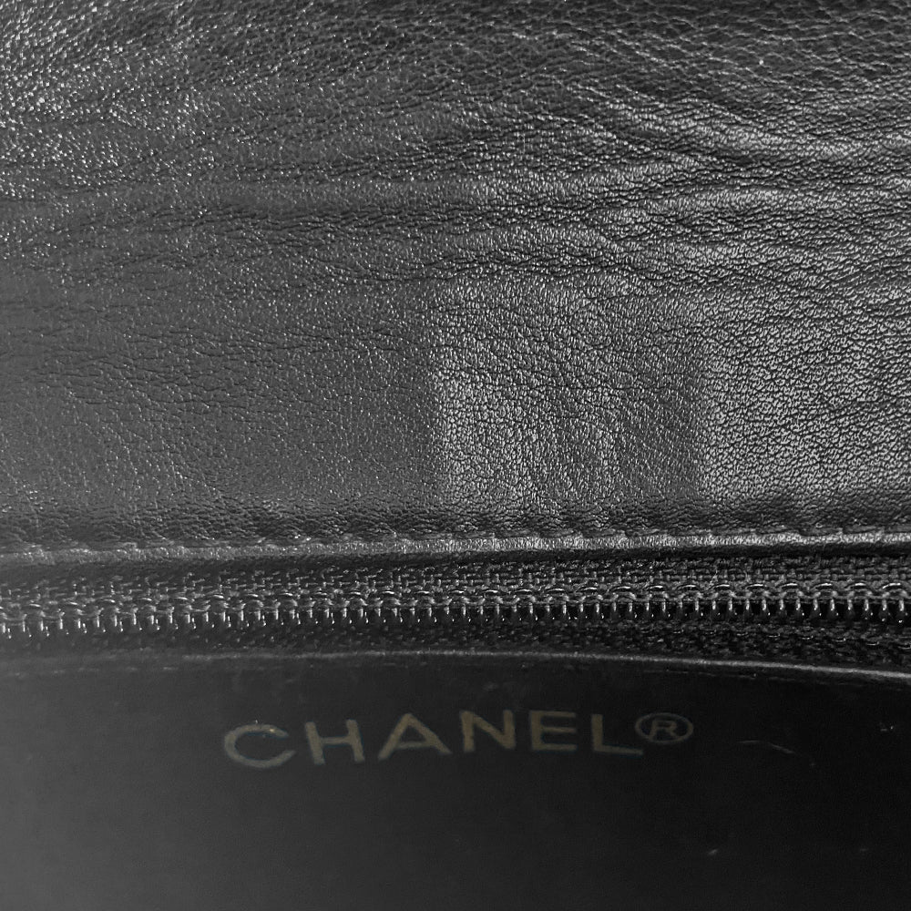 Chanel black quilted patent leather flap belt bag by Karl Lagerfeld for Chanel with gold tone turnlock closure and woven gold chain attached to adjustable belt. Black leather interior with single zip pocket. Indicated belt size: 70cm / 28 Included: Original boutique sticker and guarantee cards. Made in Italy 