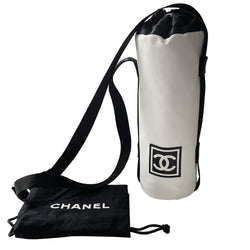 Chanel Sport canvas CC logo draw string water bottle holder by Karl Lagerfeld for Chanel, sport collection 2004. White and black nylon fabric with side zipper and CHANEL nylon webbing, adjustable long strap with sport clip closure. Box CC rubber front logo, black textile interior, date code tag attached. Made in Italy 