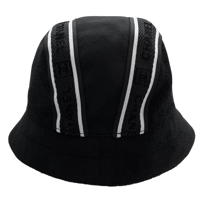 Chanel Logo Bucket Hat  From 2002 sport collection Terry cloth side panels with jersey center panel rounded bucket hat embellished with 2 black and white edged mesh bands dividing the panels Chanel and boxed CC logos printed in velvet on mesh bands Color: black with white  Size: M Fabric: Terry cloth, jersey, cotton interior  Made in France  Interior circumference (in)	22" Brim (in)	2.5"