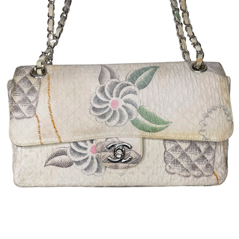 Karl Lagerfeld for Chanel 1996 printed quilt fabric flap bag with flower blossoms, pearl strands, CC logos, Chanel shoe, silver-tone CC turnlock closure, rear slip pocket, double intertwined chain and fabric chain strap, white leather lining. Interior zip pocket, 1 slip pocket, Date code tag attached. Made in France 