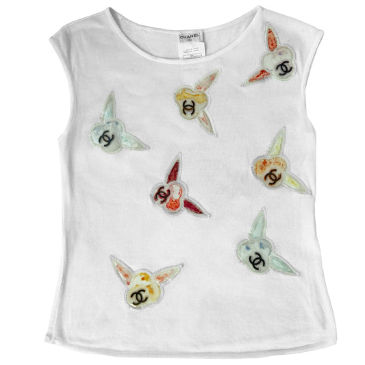 Chanel sleeveless white knit top by Karl Lagerfeld for Chanel 1997 embellished with CC logo colorful vinyl appliqué camellia flowers at front and back. Tag size: 36. Made in France 