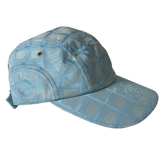 Chanel Travel Line pastel blue baseball hat by Karl Lagerfeld for Chanel, circa 2002. CC logo adjustable strap 4 panel ball cap with grosgrain inner band, silver-tone buckle and side grommets. Chanel engraved rear buckle. Size: M Made in France 