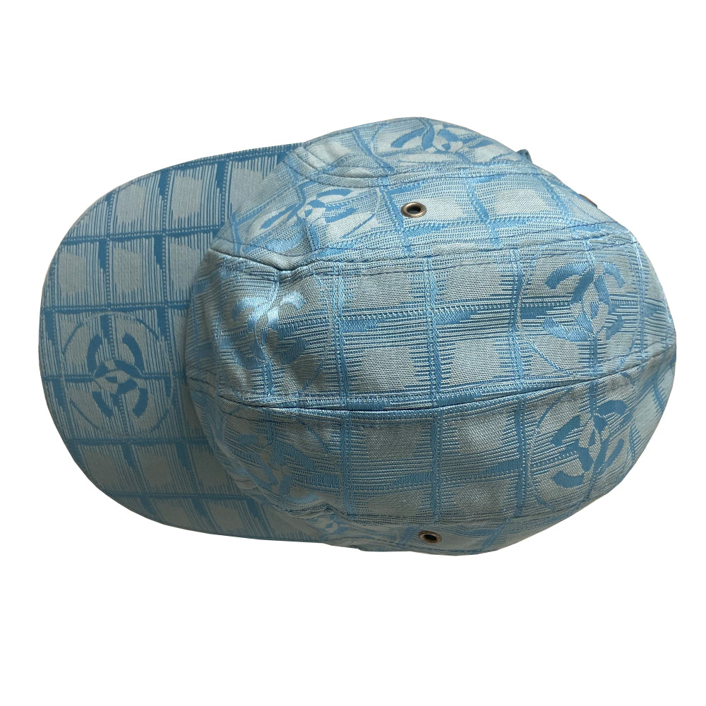 Chanel Travel Line pastel blue baseball hat by Karl Lagerfeld for Chanel, circa 2002. CC logo adjustable strap 4 panel ball cap with grosgrain inner band, silver-tone buckle and side grommets. Chanel engraved rear buckle. Size: M Made in France 