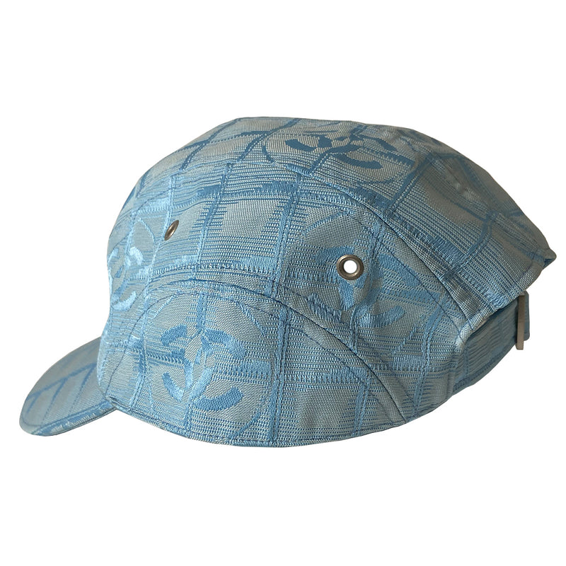Chanel Travel Line pastel blue baseball hat by Karl Lagerfeld for Chanel, circa 2002. CC logo adjustable strap 4 panel ball cap with grosgrain inner band, silver-tone buckle and side grommets. Chanel engraved rear buckle. Size: M Made in France 