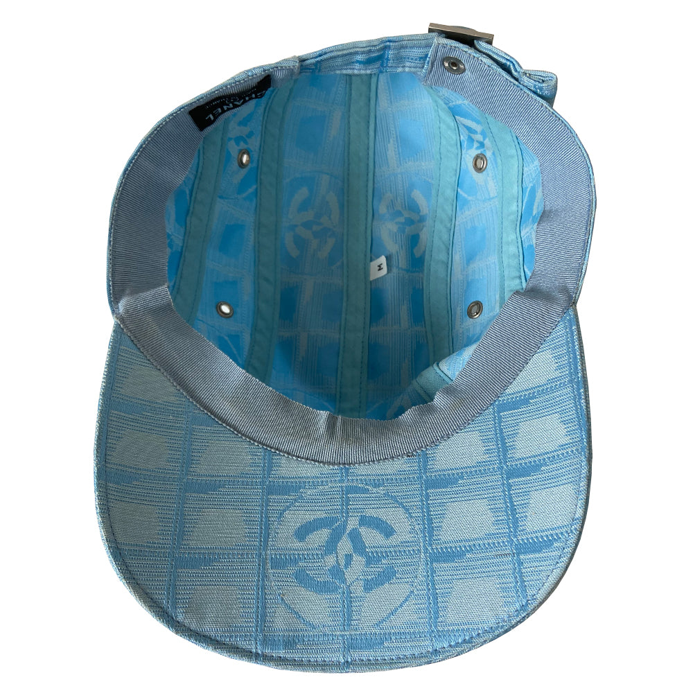 Chanel Travel Line pastel blue baseball hat by Karl Lagerfeld for Chanel, circa 2002. CC logo adjustable strap 4 panel ball cap with grosgrain inner band, silver-tone buckle and side grommets. Chanel engraved rear buckle. Size: M Made in France 