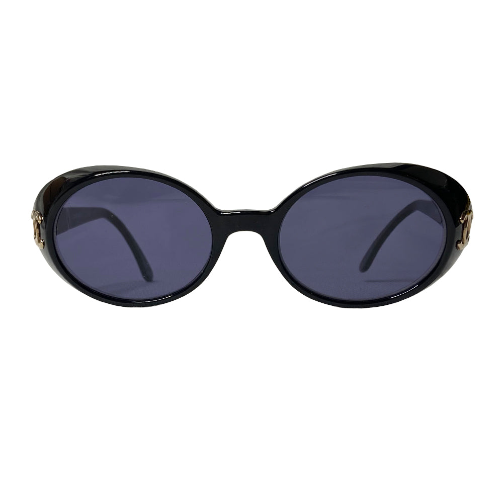 Chanel oval black acetate frame goggle style sunglasses by Karl Lagerfeld for Chanel 1990’s with interlocking CC gold logos at temple. Dark grey lenses.  Style: 05976 Case included. Made in Italy