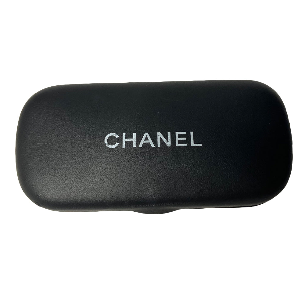 Chanel oval black acetate frame goggle style sunglasses by Karl Lagerfeld for Chanel 1990’s with interlocking CC gold logos at temple. Dark grey lenses.  Style: 05976 Case included. Made in Italy