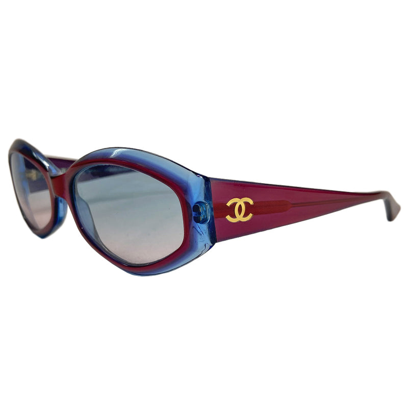 1990’s Chanel red & blue acetate frame sunglasses with red gradient lenses by Karl Lagerfeld for Chanel embellished with gold tone side CC logos. Style: 5021 c 607  Made in Italy 